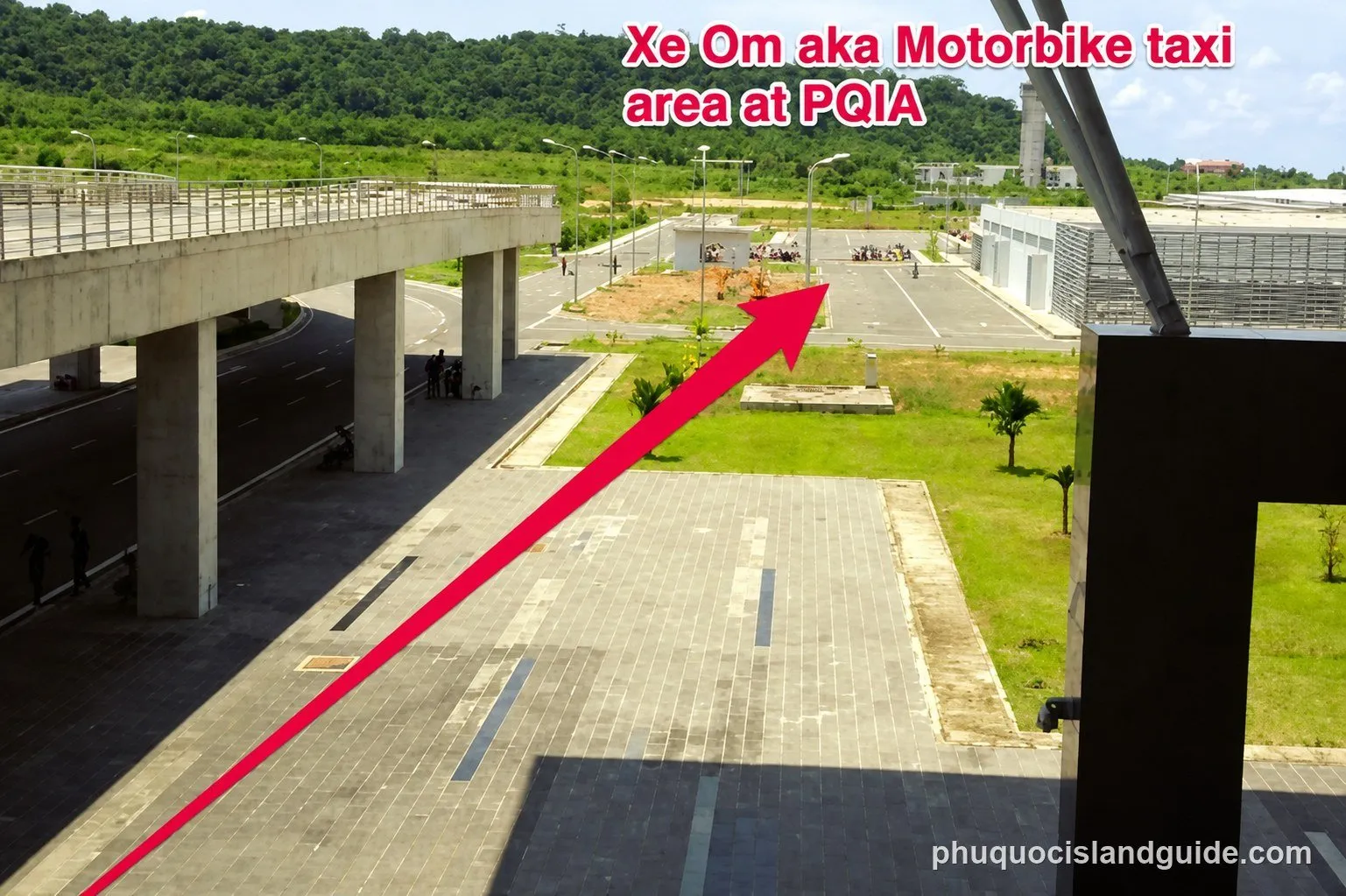 An outdoor area with an elevated road, a parking lot, and buildings, with a red arrow pointing to the motorbike taxi waiting area at Phu Quoc airport.