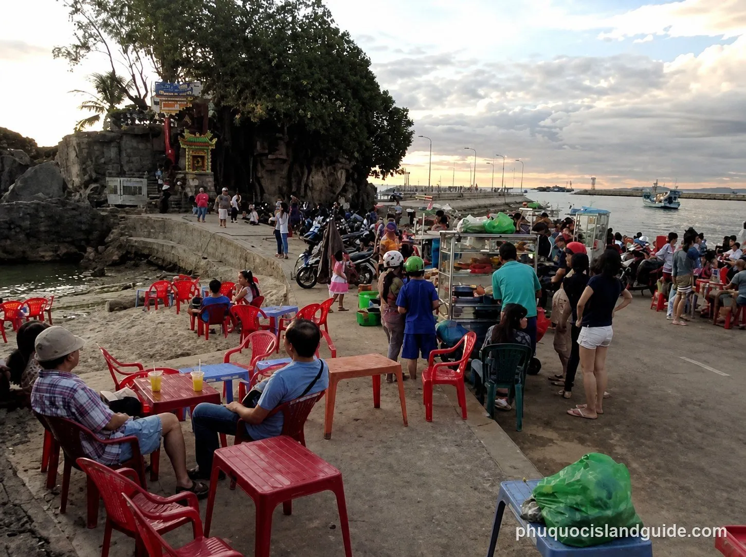 Dinh Cau rock temple and lighthouse at the mouth of the Duong Dong river